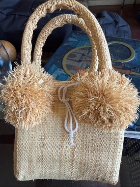 Shebobo straw mini bag.  Artisan created.  New without tags.  Please note size.